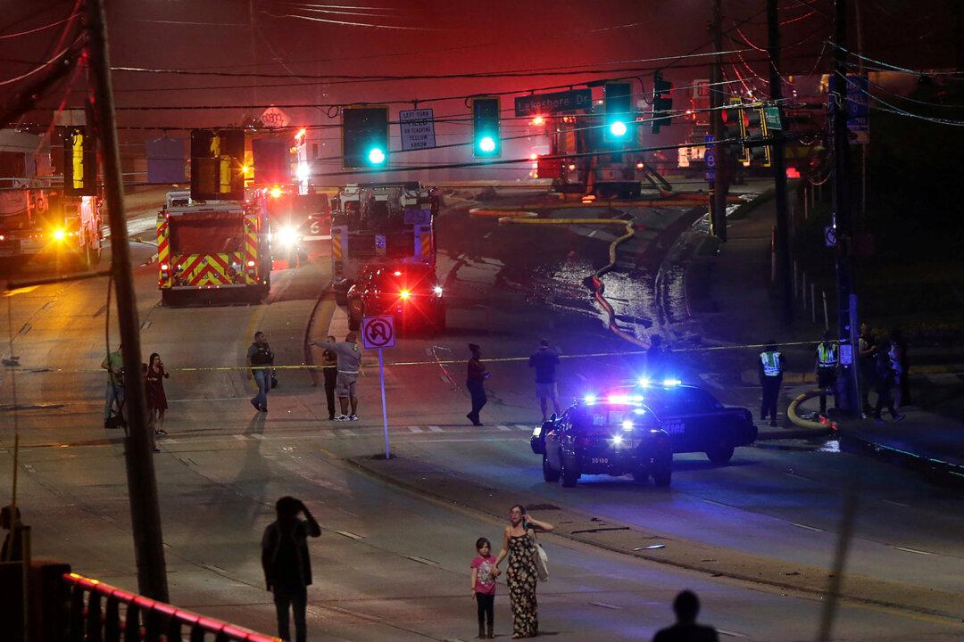 Three Transients Arrested in Atlanta Highway Bridge Collapse