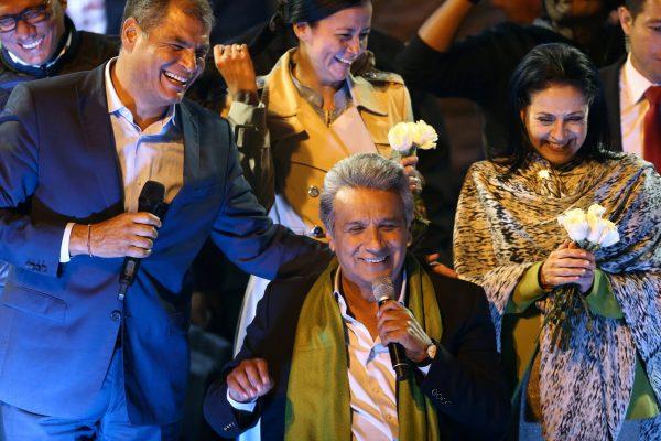 Ecuadorian presidential candidate Lenín Moreno (center) celebrates alongside Ecuadorian President Rafael Correa (left) and his wife Rocio Gonzalez during a national election day in a hotel in Quito on April 2, 2017. (REUTERS/Mariana Bazo)