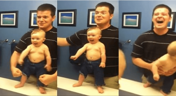 Adorable Toddler Imitates Father Flexing His Muscles