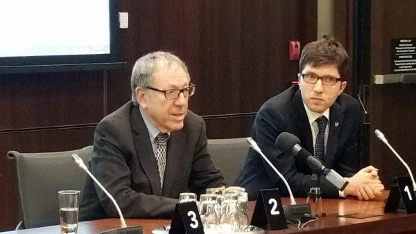 Former Liberal justice minister Irwin Cotler (L) and Conservative MP Garnett Genuis speak at an event in Ottawa on April 4, 2017. (The Epoch Times)