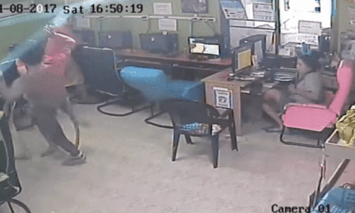 Snake Attacks Man in Internet Cafe
