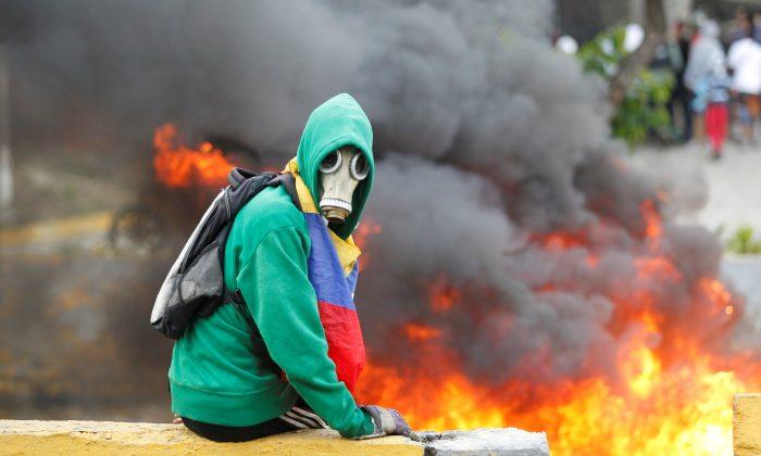 Death Toll in Venezuela’s Unrest Rises to 26