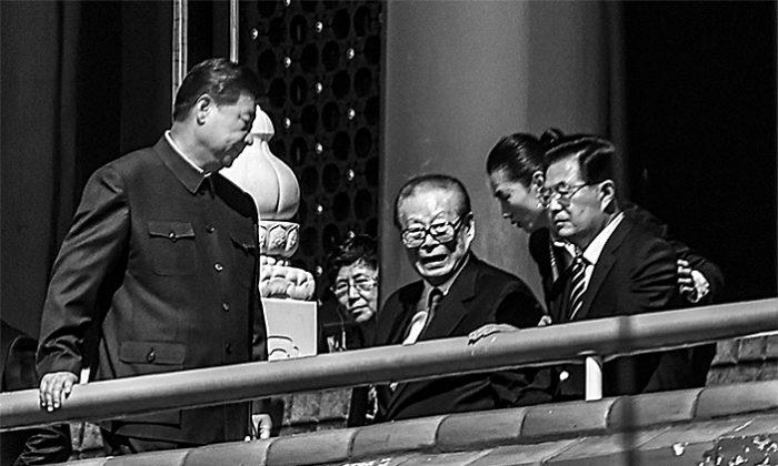 (L–R) Chinese leader Xi Jinping, with former Chinese Communist Party leaders Jiang Zemin and Hu Jintao, attend a military parade at Tiananmen Square in Beijing, China, on Sept. 3, 2015. (Greg Baker/AFP/Getty Images)