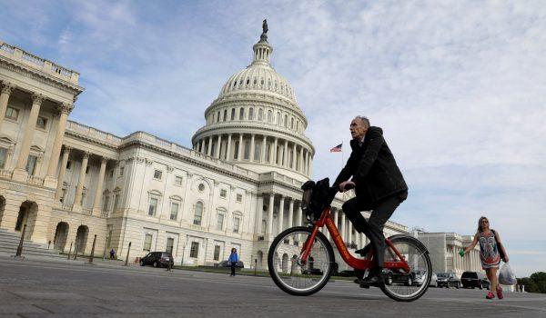 A cyclist passes the the U.S. Capitol, in Washington on May 4, 2017. (REUTERS/Kevin Lamarque)