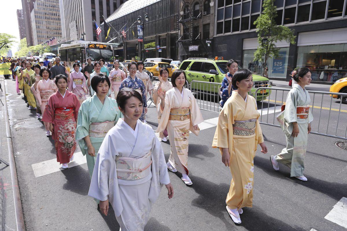Falun Gong practitioners from Japan march in the World Falun Dafa Day parade in New York on May 12, 2017. (Edward Dye/The Epoch Times)