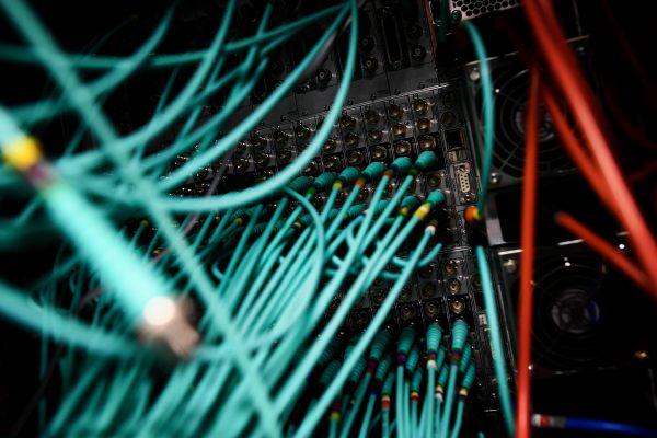 Cables and computers are seen inside a data centre at an office in the heart of the financial district in London, Britain on May 15, 2017. (REUTERS/Dylan Martinez)