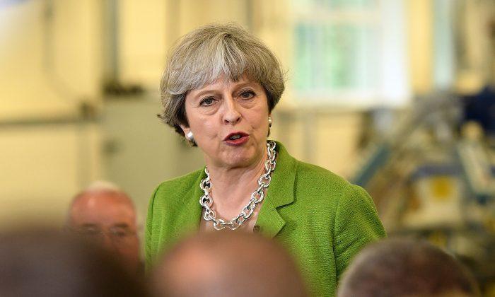 British PM May Could Lose Majority in June 8 Election, as Brexit Talks Begin