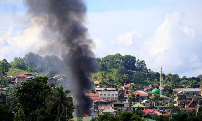 US Joins Battle as Philippines Takes Losses in Besieged City