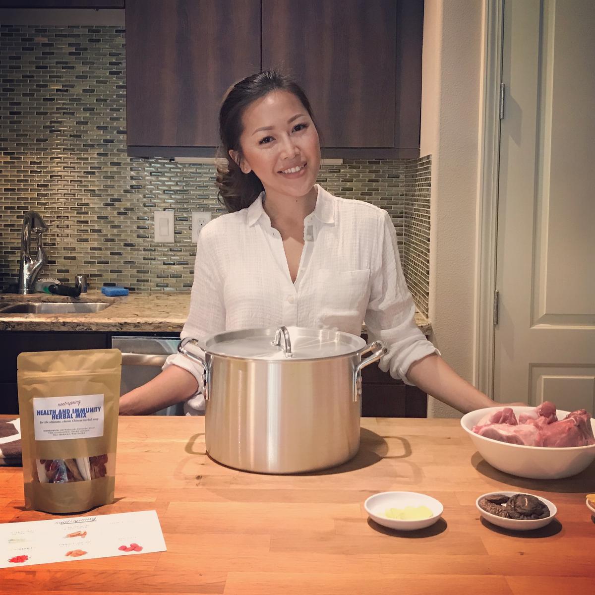 Cindy Mai in the kitchen. (Photo courtesy of root + spring).