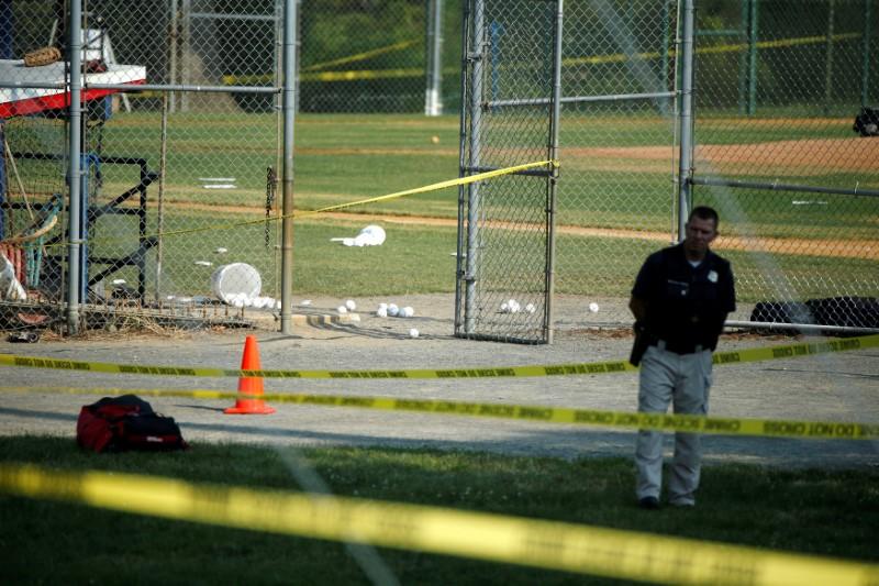A police officer mans a shooting scene after a gunman opened fire on Republican members of Congress during a baseball practice near Washington in Alexandria, Va., on June 14, 2017. (Joshua Roberts/Reuters)