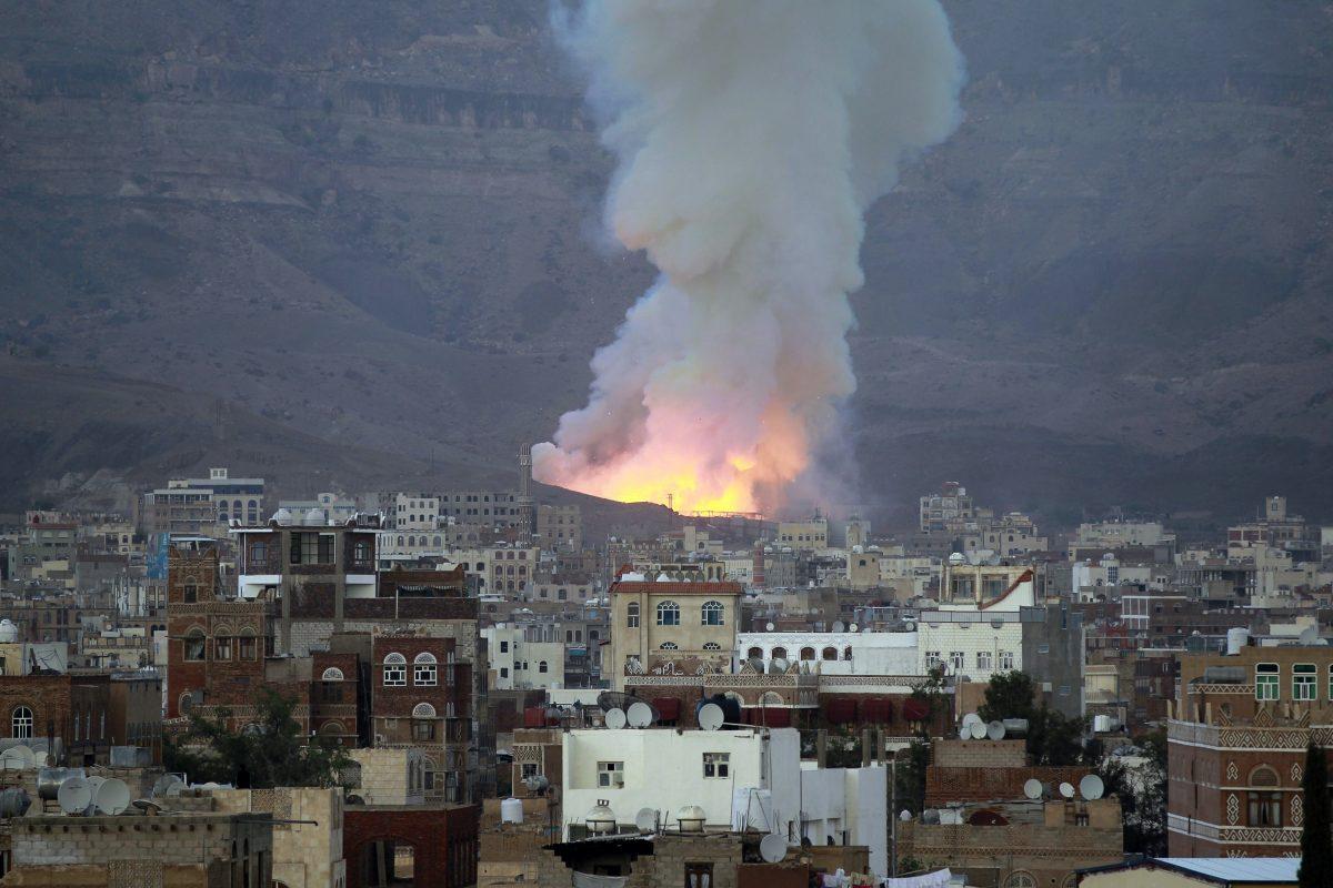 Smoke billows following an air-strike by Saudi-led coalition on May 11, 2015, in the capital Sanaa. The raid targeted an arms depot.<br/>(Mohammed Huwais/AFP/Getty Images)