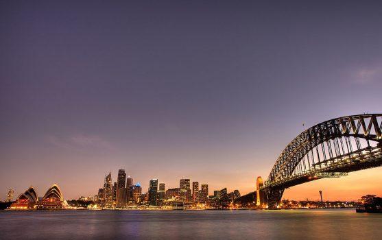 The Sydney Harbour Bridge, Opera House and Skyline is seen illuminated prior to the Earth Hour 2009 power switch off in Sydney, Australia on March 28, 2009. (Brendon Thorne/Getty Images)