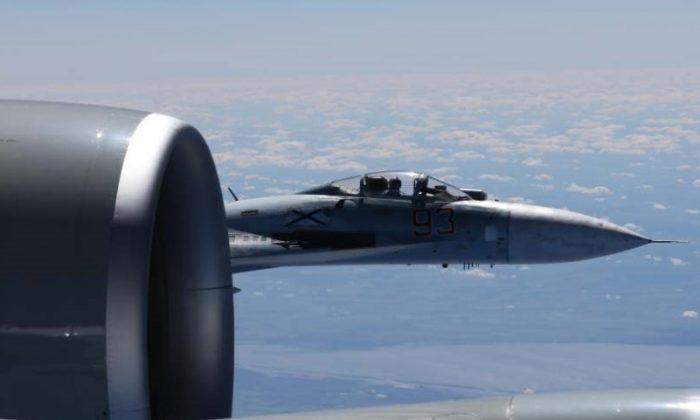 Striking Photos Released of Russian Jet Buzzing Within Feet of US Recon Plane