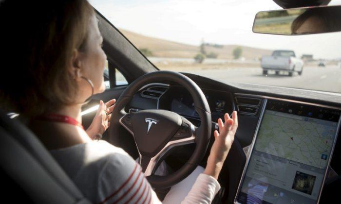 Tesla, Others Seek Ways to Ensure Drivers Keep Their Hands on the Wheel