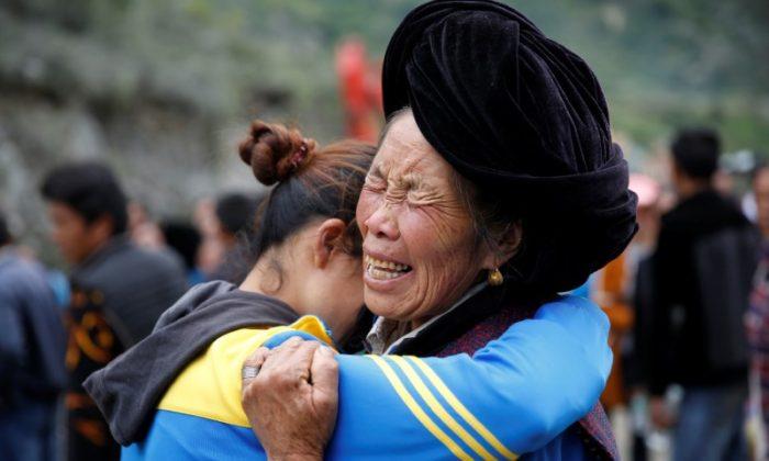 Villagers Begin to Mourn Dead After Deadly China Landslide