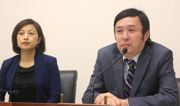 Mr. Li Jun (r), director and producer of the award-winning documentary, “Harvested Alive, 10 Years of Investigation,” answers questions after the English premiere on June 23, 2017, at a Congressional building in Washington. To his right is Dr. Peng Tao, the film's co-producer. (Gary Feuerberg/The Epoch Times)