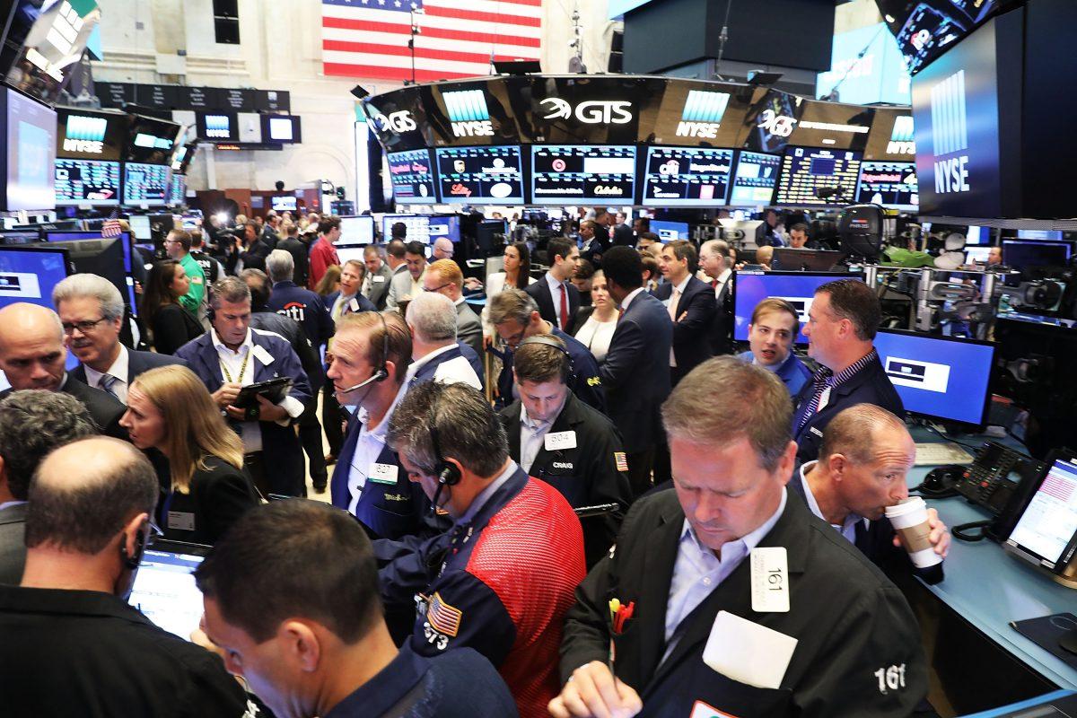Traders work on the floor of the New York Stock Exchange on June 30, 2017. (Spencer Platt/Getty Images)
