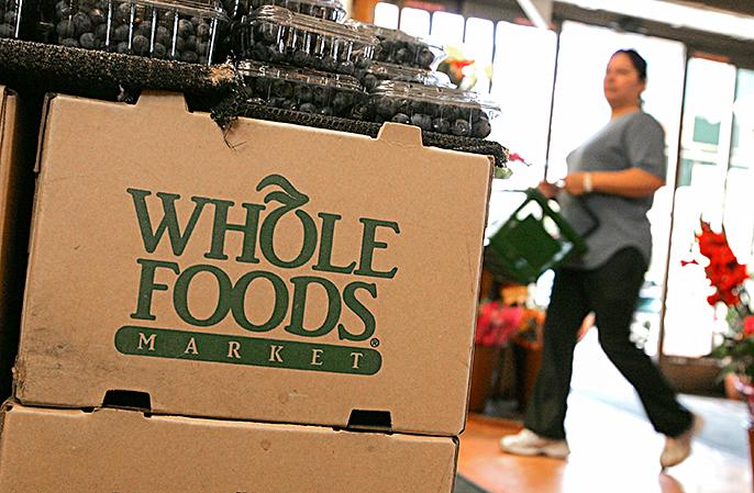 The Whole Foods logo adorns a cardboard box at a Whole Foods Market in a file photo. (Photo by Justin Sullivan/Getty Images)