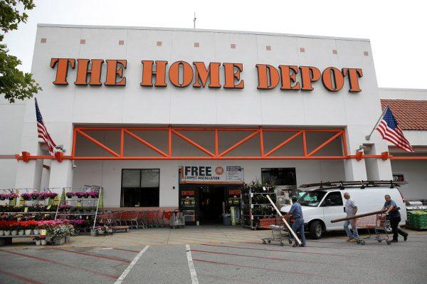 Customers enter a Home Depot store on May 16, 2017 in Redwood City, California. (Photo by Justin Sullivan/Getty Images)