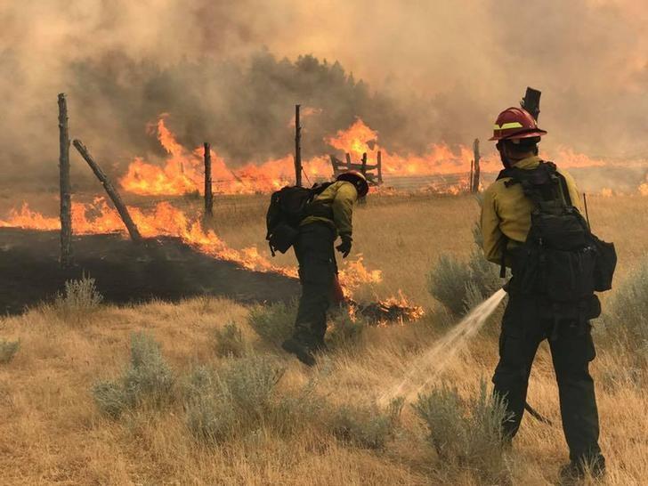 Crews Gain Ground Against Montana Wildfire, Largest in US