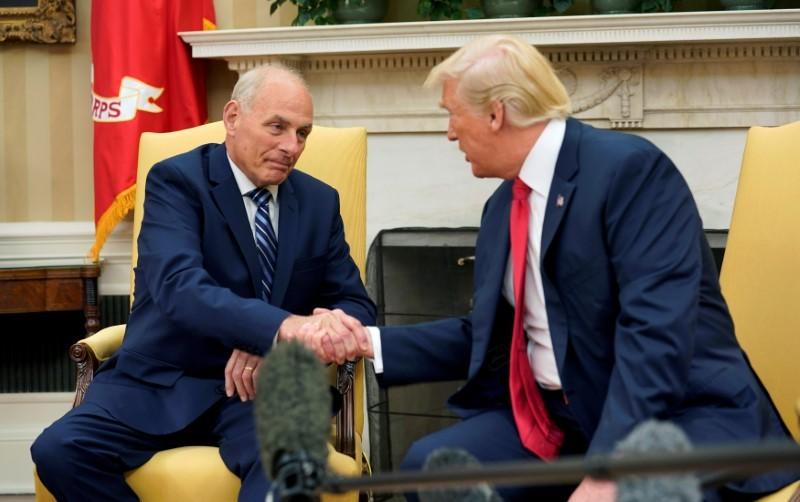 President Donald Trump shakes hands with John Kelly after he was sworn in as White House Chief of Staff in the Oval Office of the White House on July 31, 2017. (REUTERS/Joshua Roberts)