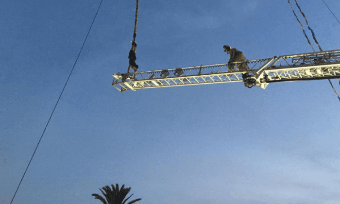 Bungee Jumper Left Hanging After Malfunction at Fair