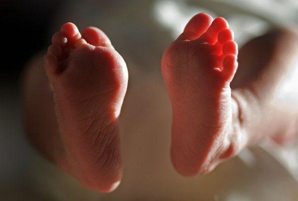 A two-week-old baby's feet taken on March 20, 2007. (Christopher Furlong/Getty Images)