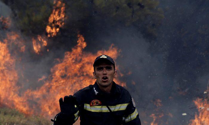 Firefighters Battle Wildfires Near Athens for Third Day