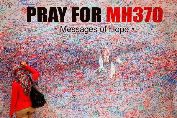 A woman left a message of support and hope for the missing Malaysia Airlines MH370 passengers in central Kuala Lumpur on March 16, 2014. (Reuters/Damir Sagolj/File Photo)