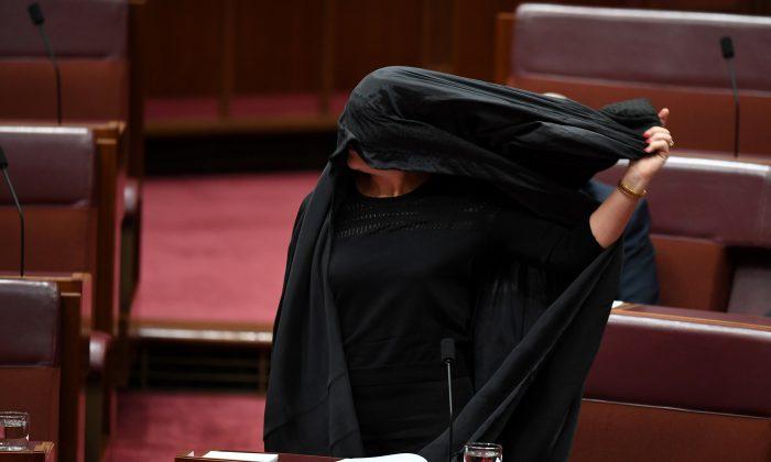 Australia’s Hanson Wears Burqa to Parliament in Bid to Ban Them
