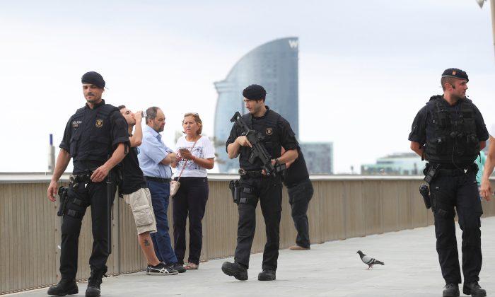 Spain Says Cell Behind Catalan Attacks Dismantled, Police Seek Van Driver