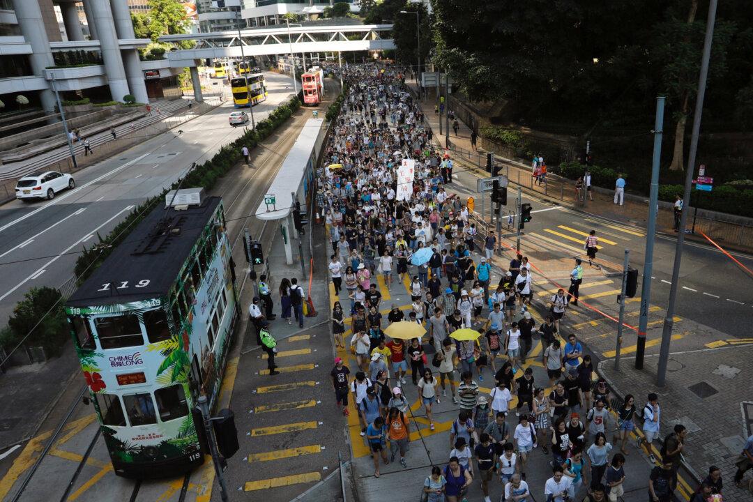 Thousands Protest in Hong Kong Over Jailing of Democracy Activists