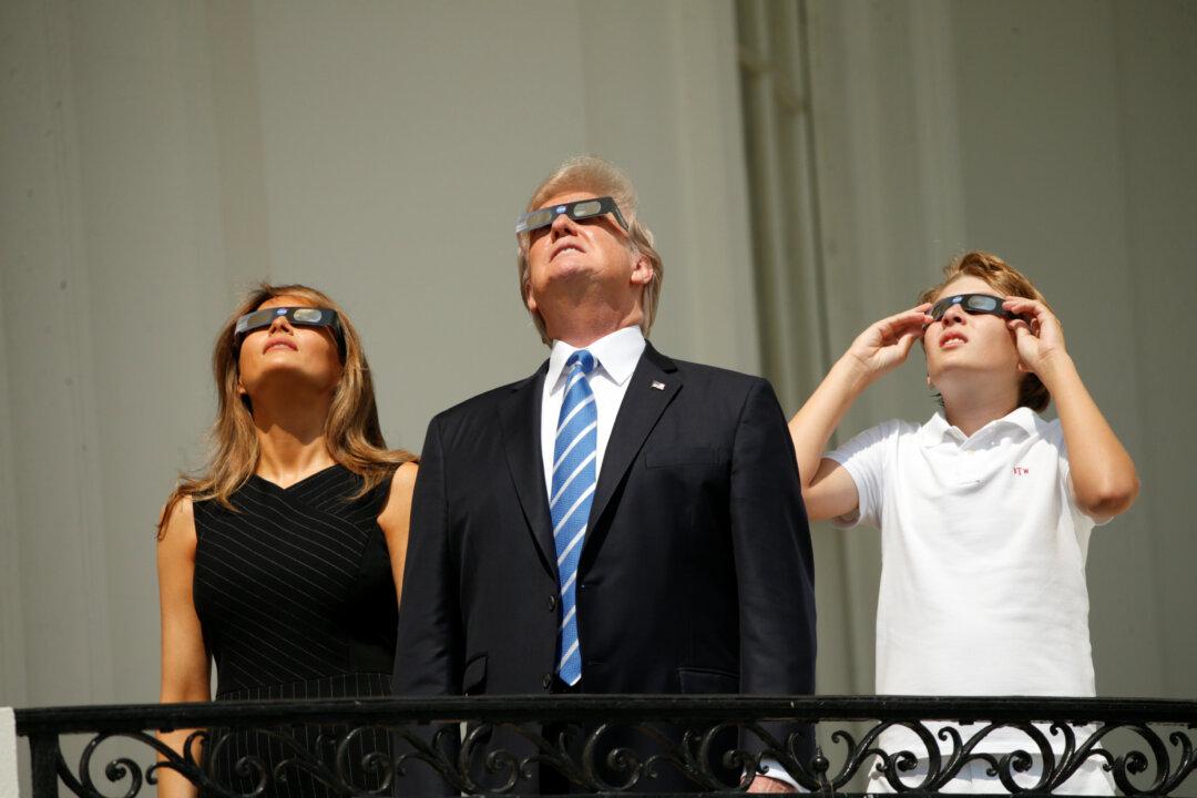President Donald Trump Watches the Eclipse at the White House