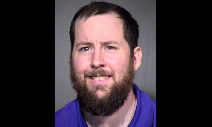 Arrested: Protester Seen Throwing Gas Canisters Toward Police in Phoenix Protest