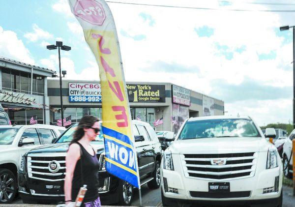 An auto dealership in Queens, New York, on May 2. Auto loans, dubbed the new subprime, are the fastest-growing category of consumer debt. (Spencer Platt/Getty Images)