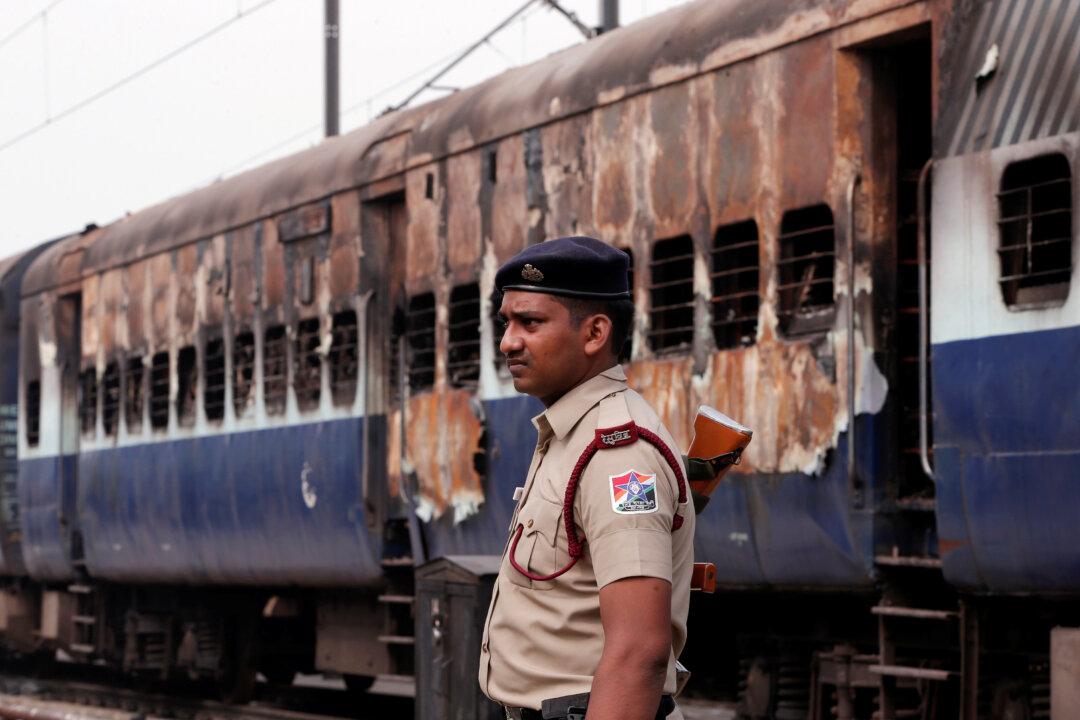India Detains Hundreds, Cancels More Than 300 Trains After Deadly ‘Godman’ Protests