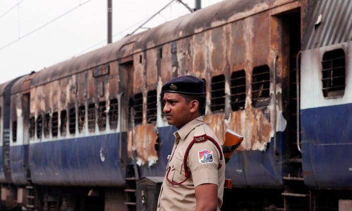 India Detains Hundreds, Cancels More Than 300 Trains After Deadly ‘Godman’ Protests