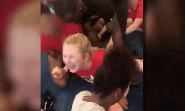 Cheerleader Coach Has Been Fired for Forcing Girls Into the Splits