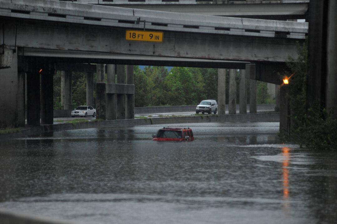 People in Waist-Deep Water Rescued on Live Television