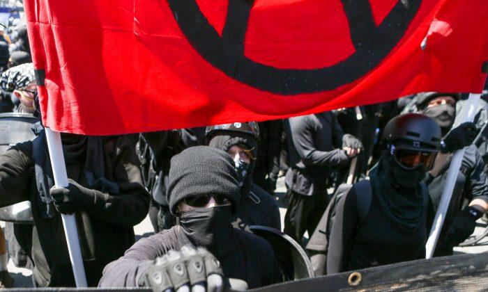 Masked Antifa Members Block, Shout at Elderly Couple Crossing Street During Protest