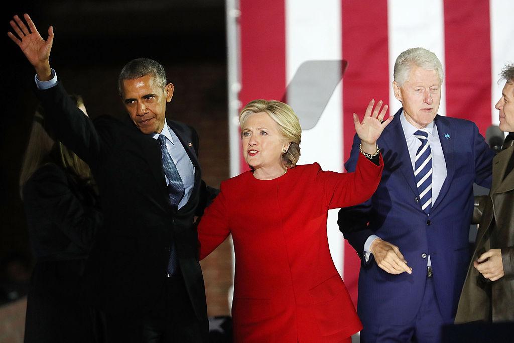 Democratic presidential nominee former Secretary of State Hillary Clinton stands with President Barack Obama during an election eve rally in Philadelphia, Pennsylvania on Nov. 7, 2016. (Spencer Platt/Getty Images)
