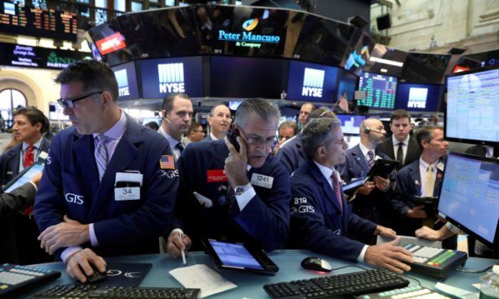 Wall Street Opens Higher as Data Lowers Rate Hike View