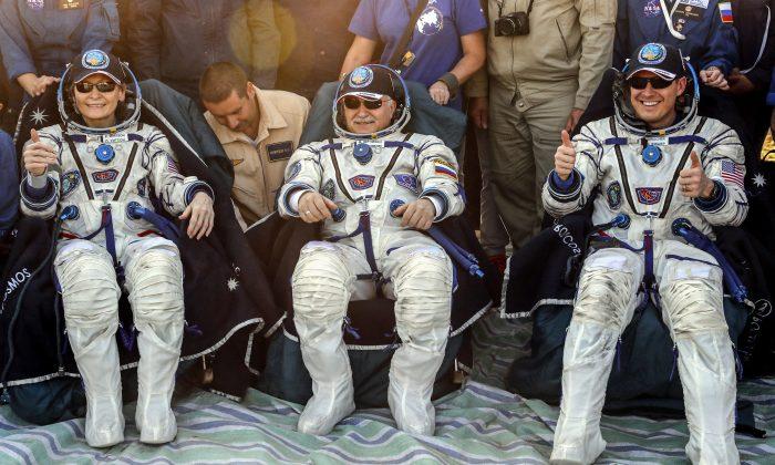 Record-Breaking US Astronaut and Crew Back on Earth