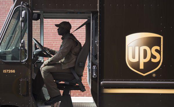 A UPS driver departs a company facility on West 43rd Street in New York on May 9, 2017. (Don Emmert/AFP/Getty Images)