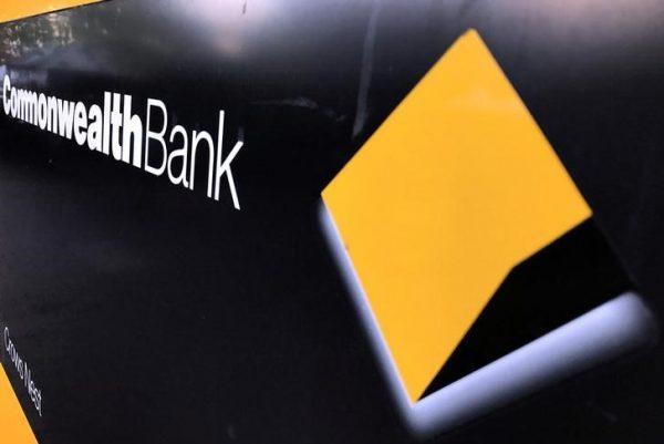 File Photo: A Commonwealth Bank of Australia logo adorns the wall of a branch in Sydney, Australia, May 8, 2017. Picture taken May 8, 2017. (Reuters/David Gray/File Photo)
