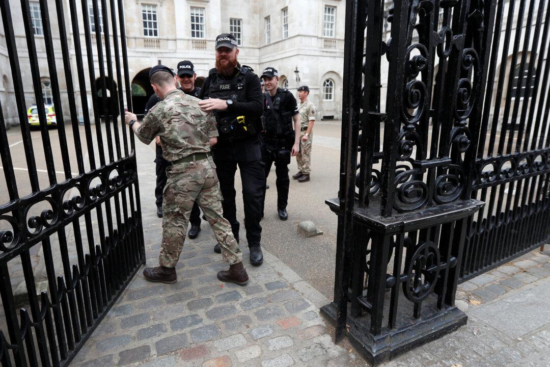 British Police Arrest Man in Hunt for London Bombers