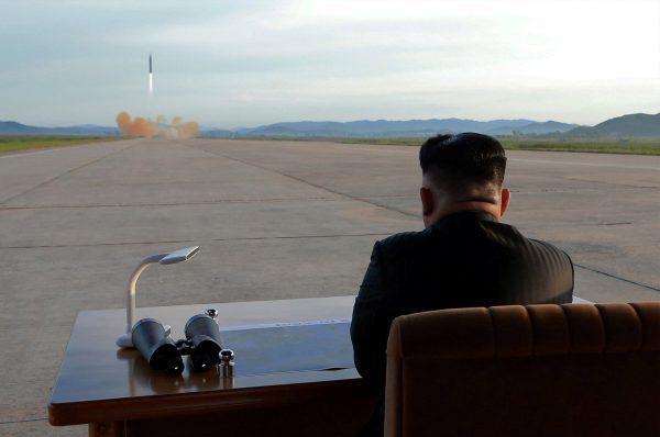 North Korean leader Kim Jong Un watches the launch of a Hwasong-12 missile in this undated photo released by North Korea's Korean Central News Agency (KCNA) on Sept. 16, 2017. (KCNA via REUTERS)