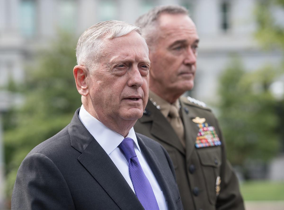 Defense Secretary Gen. Jim Mattis (L) and Gen. Joseph Dunford, chairman of the Joint Chiefs of Staff, arrive to speak to the press about the situation in North Korea at the White House in Washington on Sept. 3, 2017. (NICHOLAS KAMM/AFP/Getty Images)