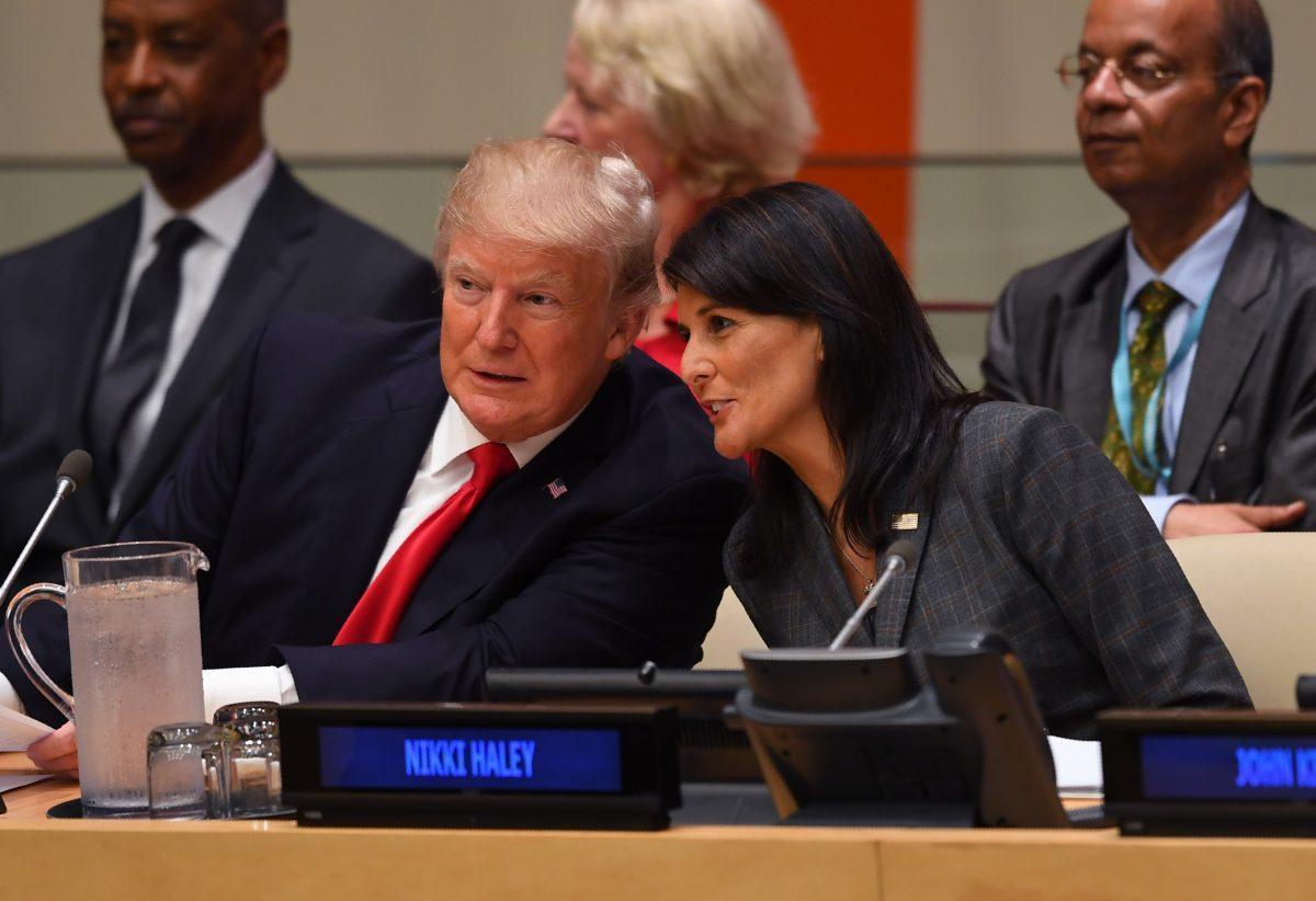 Then-President Donald Trump and then-U.S. ambassador to the United Nations Nikki Haley speak during a meeting on United Nations Reform at the United Nations headquarters in New York on Sept. 18, 2017. (Timothy A. Clary/AFP/Getty Images)