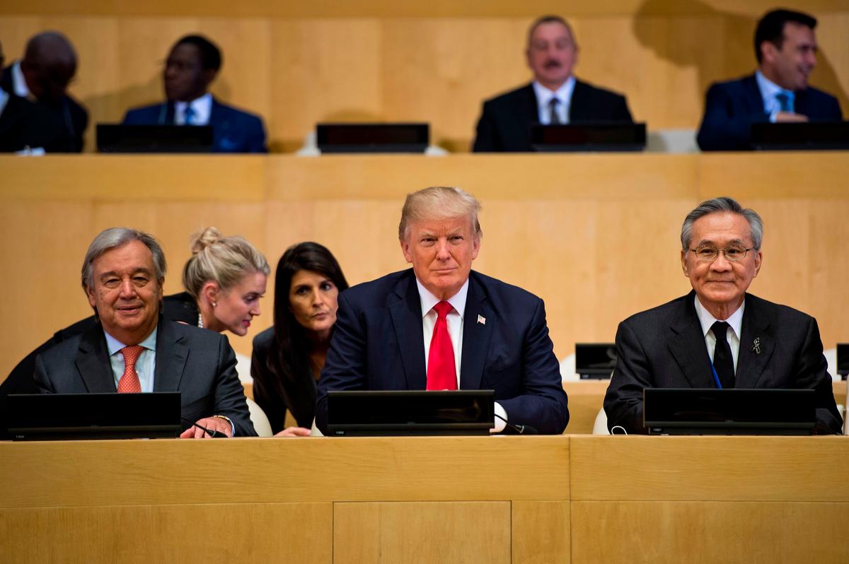 (L-R) UN Secretary-General Antonio Guterres (L), President Donald Trump, and Thailand's Foreign Minister Don Pramudwinai at the UN headquarters in New York on Sept. 18, 2017. (BRENDAN SMIALOWSKI/AFP/Getty Images)